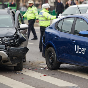 Uber car accident with police, symbolizing Florida rideshare laws and legal claims